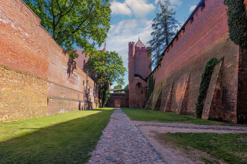 Malbork, Poland - the photo shows a fragment of the Teutonic Knights' castle, dedicated to the Blessed Virgin Mary. The castle was built in several stages from 1280 to the mid-15th century.