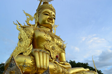 Obraz premium Golden Buddha statue , Symbols of Buddhism, South East Asia in evening at Wat Phra That Doi Saket temple Chiang Mai ,Northern Thailand