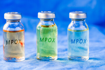 Mpox new vaccine in ampules, different color variations of vaccine