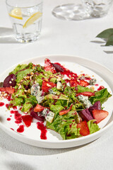 Fresh Strawberry and Blue Cheese Salad with Mixed Greens and Beetroot - Healthy Summer Dish
