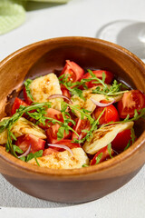 Grilled Halloumi Cheese Salad with Tomatoes and Arugula Close-Up