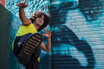 young african american man dancing on the street urban dance © tetxu
