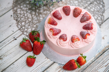 strawberry cake on a wooden table