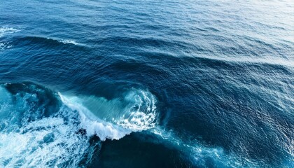 Fototapeta premium Top view on blue ocean waves. Nature background,, water, ocean, wave, waves, nature, boat, surf, beach, foam, storm, summer, splash, blue, coast