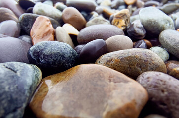 Beautiful Abstract background with pebbles - round sea stones.