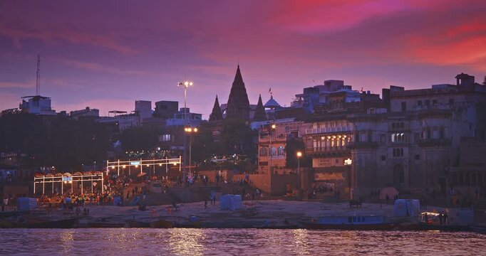Varanasi, India. Hundreds Of Tourists And Locals Gather On Boats To Watch Fire Ceremony Or Puja At Assi Ghat. Ganga Maha Aarti Ceremony. Traditional Ganga Aarti In Varanasi. Cinematic Camera Movement