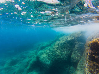 Underwater photography. Mediterranean Sea off the coast of Nice in southern France, seabed and rocks.