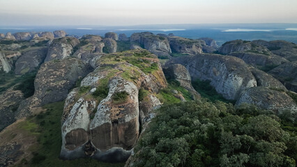 Exploring the unique rock formations of the Pedras Negras Mountains in Angola at sunrise