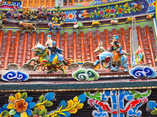 Ornate Statues of Gods and Goddesses on a Taiwanese Temple Roof