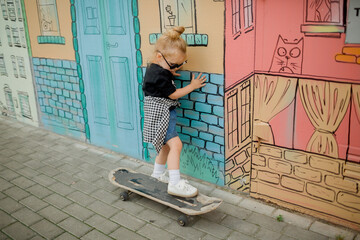 little girl with skateboard © Anastasiya Krychun