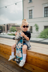 little girl with skateboard © Anastasiya Krychun