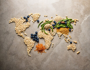 world map of food and vegetables on concrete background