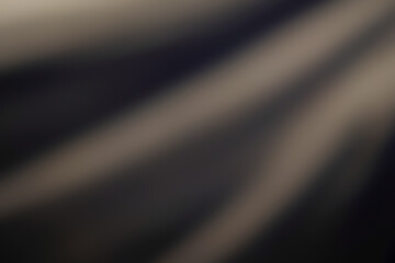 Cream, brown and black blurred background image