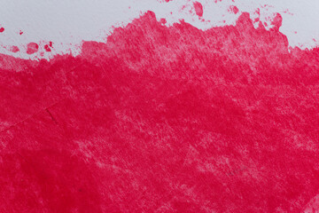 赤色の絵具を塗った背景