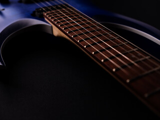 Fototapeta premium Fretboard of modern electric guitar. Close up.
