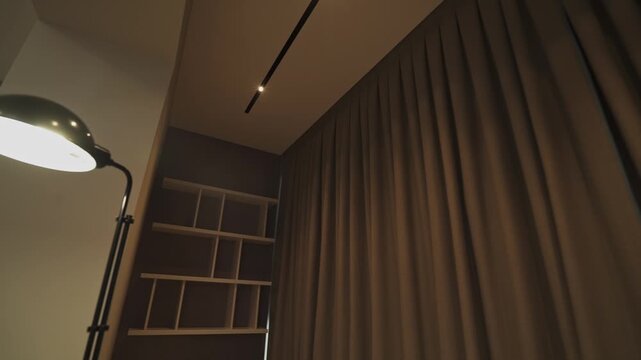 empty bookshelves in the balcony area