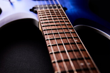 Obraz premium Fretboard of modern electric guitar. Close up. 
