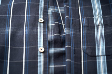 Close up of Men's checkered shirt.