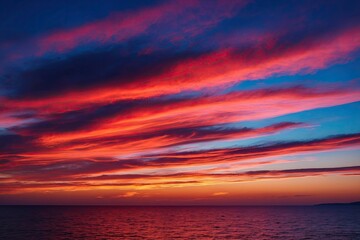Obraz premium Breathtaking Vibrant Sunset Colors in the Dusk Sky over Scenic Horizon