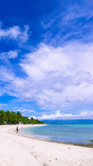 Bonbon Beach white sand on a sunny day. Portrait. Romblon Island, Philippines
