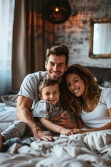 Obraz premium A family of four - a man, woman, and two children - are sleeping peacefully in a bed