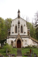The cemetery church is in the middle of the forest