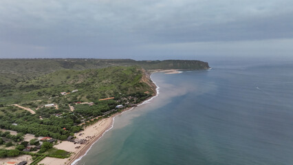 Aerial view of the green coast of Angola showcasing lush landscapes and the Atlantic shoreline