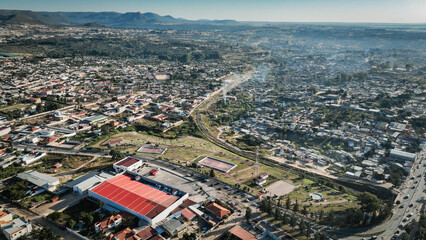 Aerial view of Lubango City showcasing urban landscape and mountainous backdrop in Angola