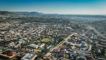 Aerial view of Lubango City showcasing urban landscape and surrounding mountains in Angola
