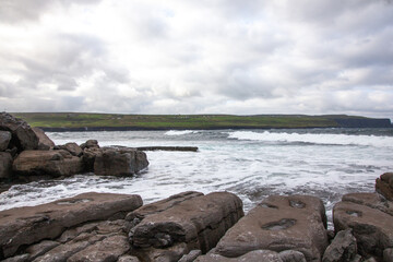 beach and rocks on the ocean