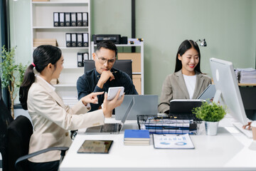Business team discuss at meeting room. working together with laptop ,tablet and smart phone on desk Financial