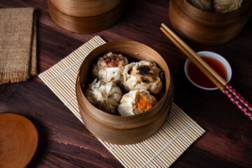Dimsum. Chinese meal made from chicken, fish, or shrimp meat covered with dimsum skin. Perfect for recipe, article, catalogue, or any cooking contents.