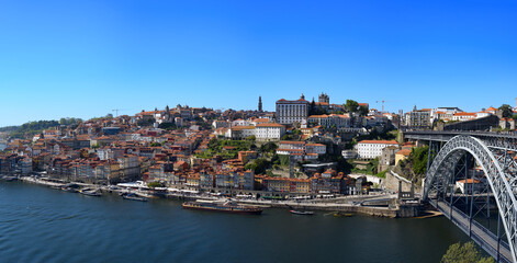 Fototapeta premium Panorama of Porto harbour at Douro river, Portugal in sunny summer day