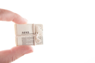 image of miniature newspaper white background