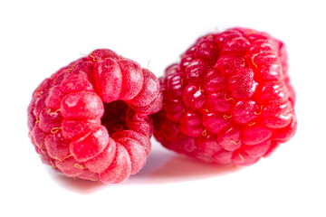 ripe raspberries on white background