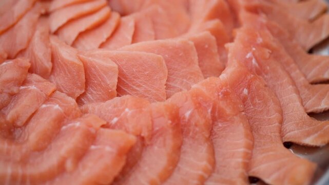 The salmon fillet is elegantly served on a beautifully decorated plate, ready to be enjoyed for its deliciousness.