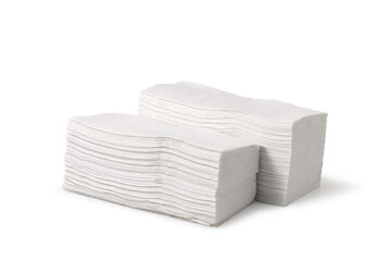 Paper towel piles isolated on a white background with a clipping path. Hygiene, health care, and safety concepts.