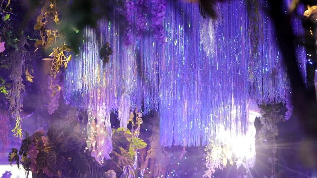 Banquet hall decorated for wedding or party with  flowers and scenic light