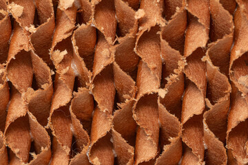 Abstract,  The evaporative-cooling-pad paper image shows a close-up view of a rough, textured...
