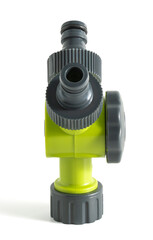 Garden hose splitter. It's a device used to split a single water source into two separate outlets. This type of device is commonly used in gardening, landscaping, and general outdoor water management