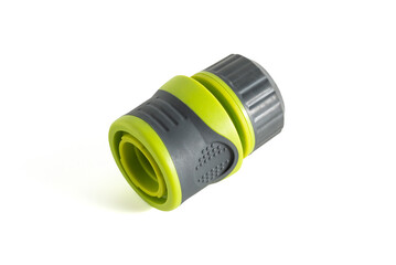 Garden hose connector or coupler isolated on a white background. This type of connector is commonly used to join sections of garden hose or to attach hoses to sprinklers, nozzles, or faucets.