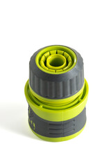 Hose adapter with quick-connect fitting for gardening and outdoor watering systems isolated on a...