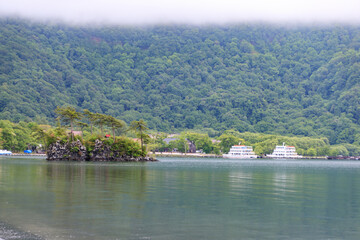 Fototapeta premium Misty Morning with Islands on Lake Towada, Aomori, Japan