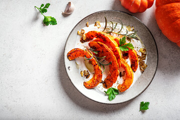 Roasted pumpkin with greek yogurt and herbs