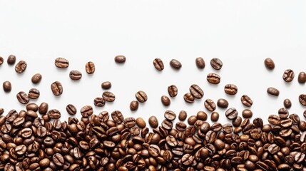 Obraz premium Coffee beans on white background with copy space