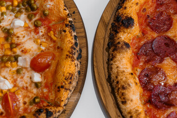 Pizza with salami and prosciutto. Meat pizza with cheese