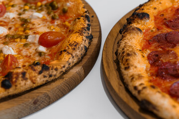 Pizza with salami and prosciutto. Meat pizza with cheese