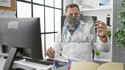 Hispanic doctor examines an x-ray in a modern clinic office, portraying professionalism and healthcare.