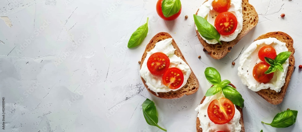 Poster healthy breakfast recipe featuring rye toast with cream cheese tomatoes and basil captured in a top 