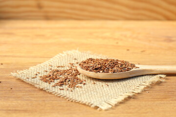 flaxseeds in a wooden spoon
